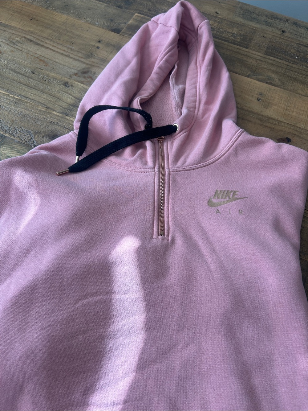 Nike Pink Half-Zip Hoodie with Black Drawstring and Gold Logo